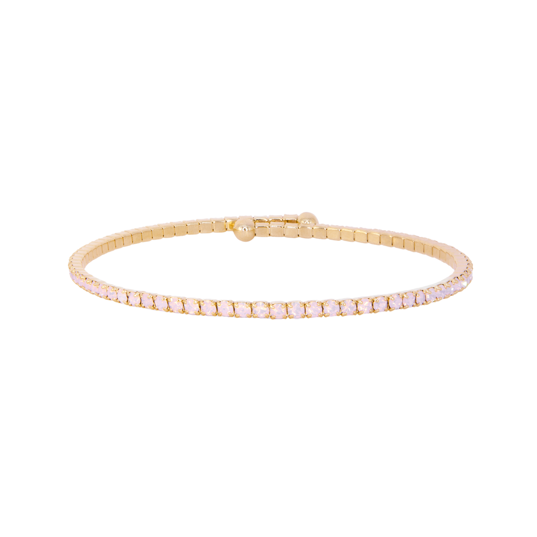 Gold bracelet with small diamonds on a white background