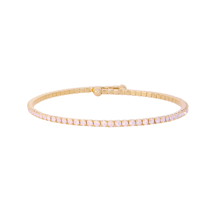 Gold bracelet with small diamonds on a white background