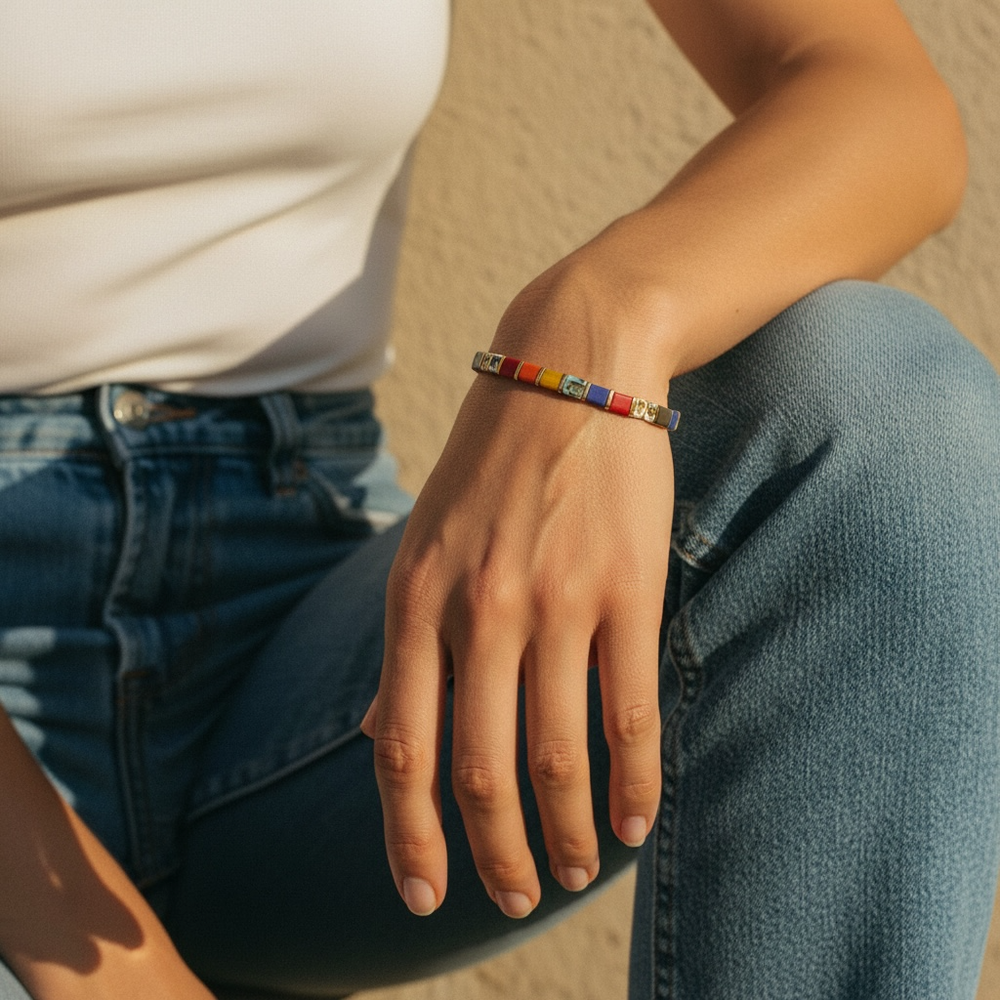 Bazaar Tila Bracelet worn on wrist with white top and denim showing vibrant statement colors