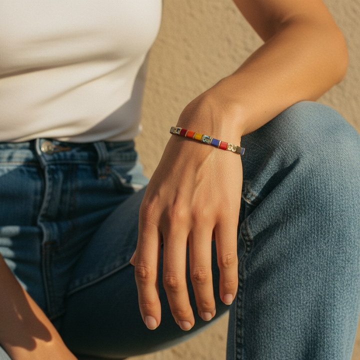 Bazaar Tila Bracelet worn on wrist with white top and denim showing vibrant statement colors