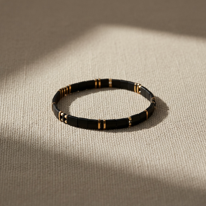 Blackout Tila Bracelet styled on linen – Sugar Bean Jewelry