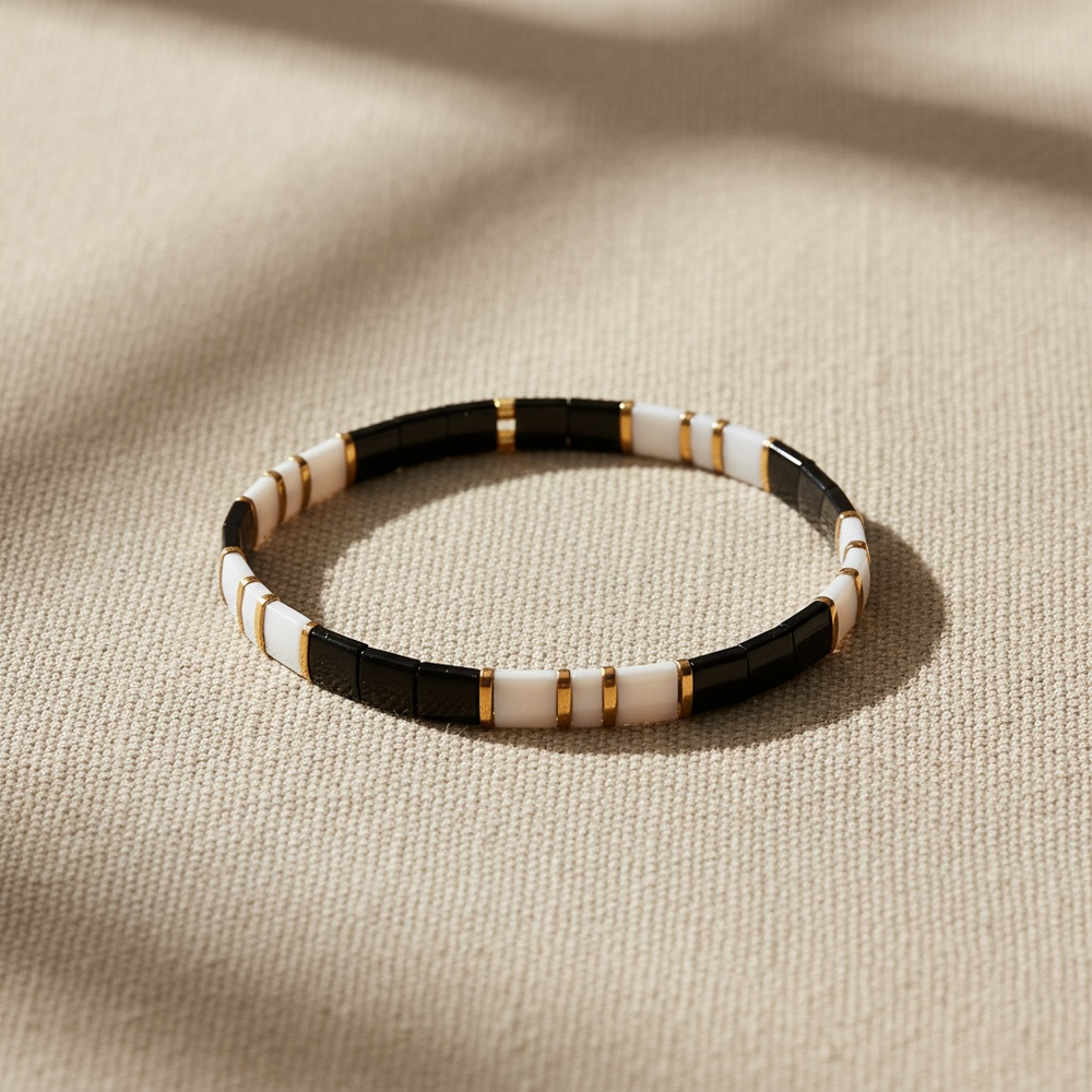 Cipher Tila Bracelet styled on linen – Sugar Bean Jewelry