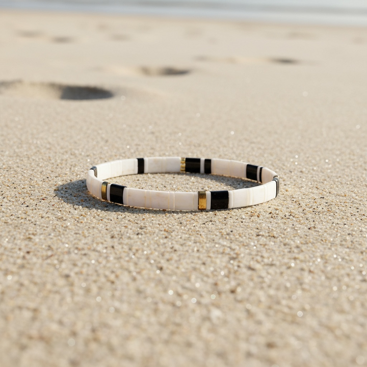 Domino Tila Bracelet styled on sand – Sugar Bean Jewelry