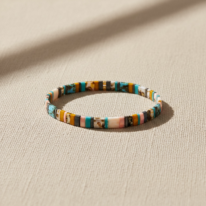 Free Spirit Tila Bracelet styled on linen – Sugar Bean Jewelry