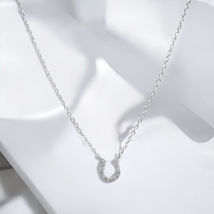 TINY HORSESHOE NECKLACE