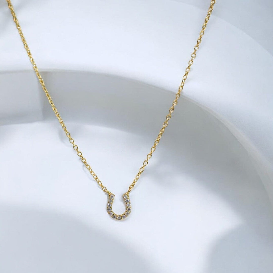 TINY HORSESHOE NECKLACE