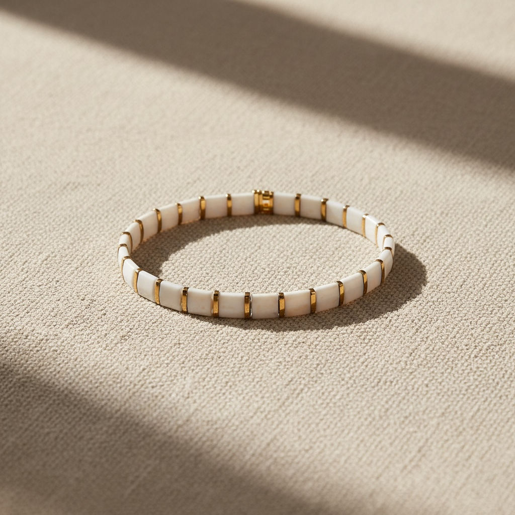 Ivory Coast Tila Bracelet styled on linen – Sugar Bean Jewelry