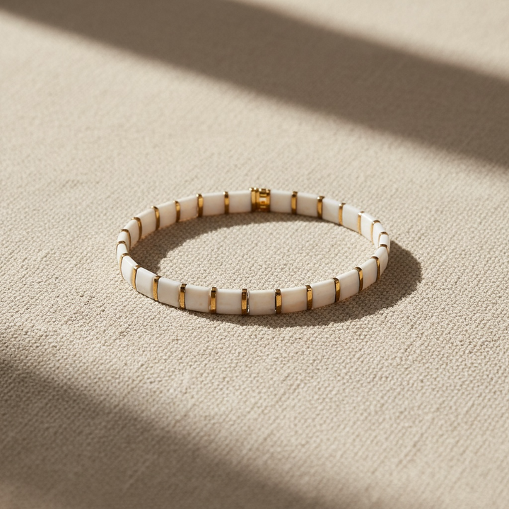 Ivory Coast Tila Bracelet styled on linen – Sugar Bean Jewelry