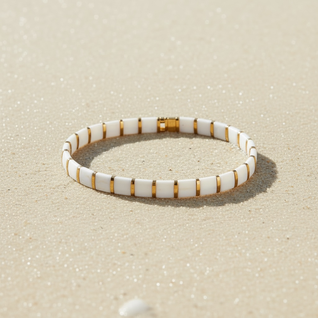 Ivory Coast Tila Bracelet styled on sand – Sugar Bean Jewelry