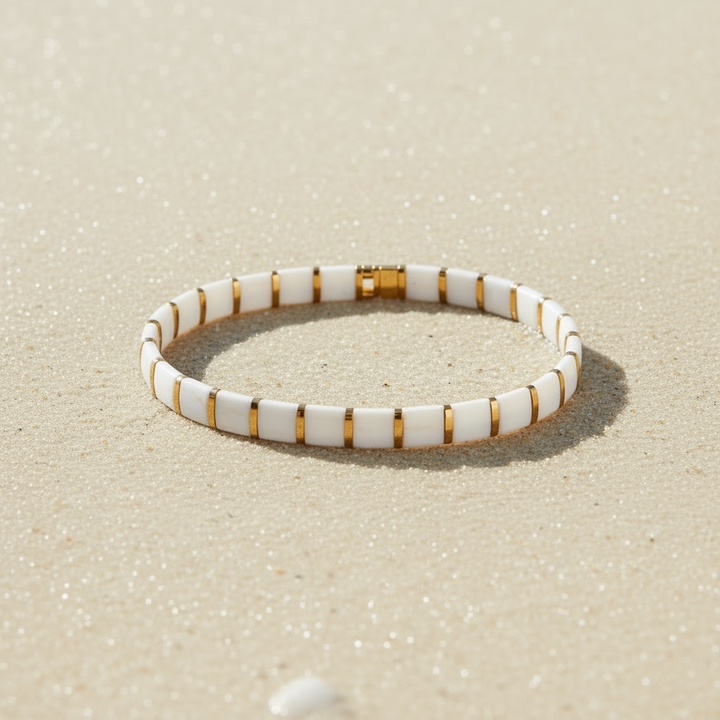 Ivory Coast Tila Bracelet styled on sand – Sugar Bean Jewelry