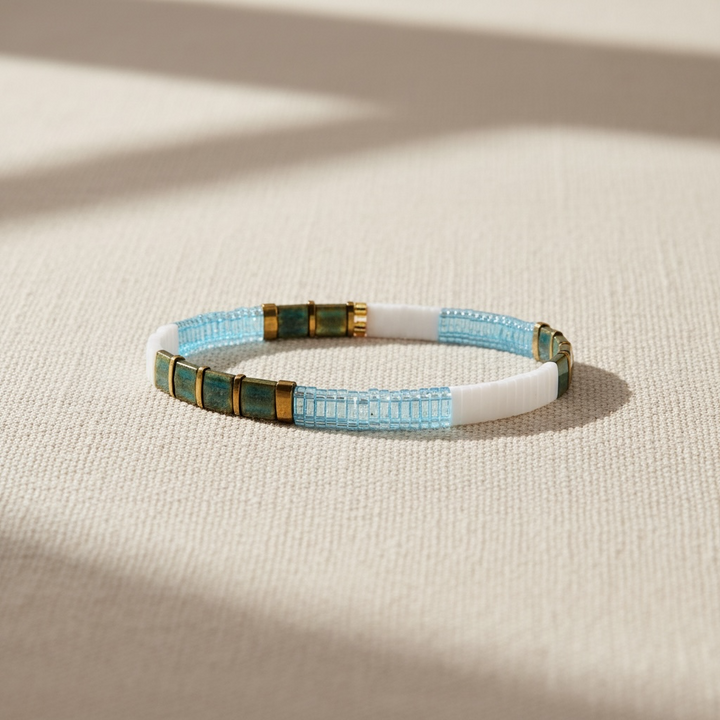 Open Water Tila Bracelet styled on linen – Sugar Bean Jewelry