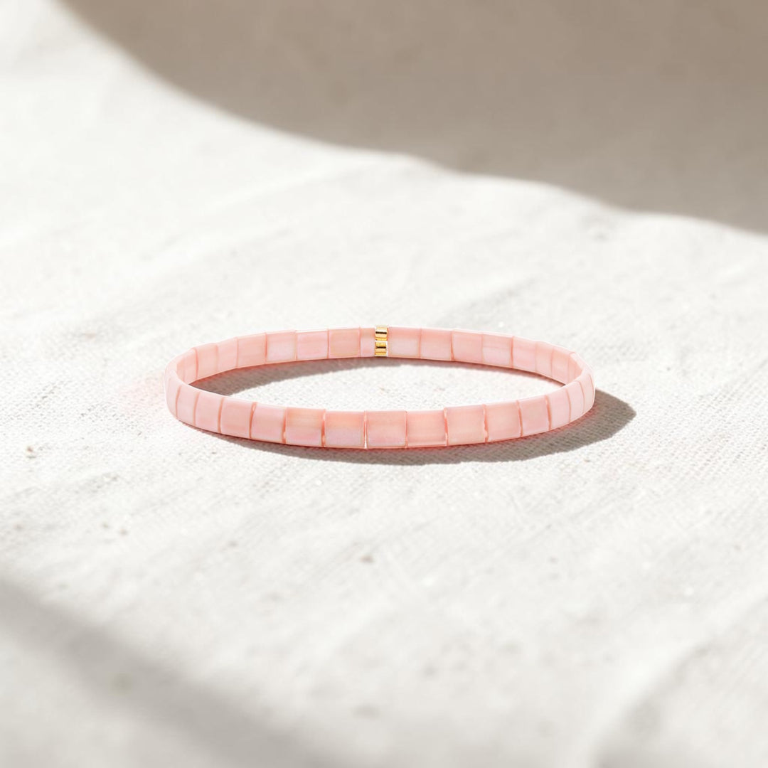 Close-up of peach Miyuki Tila beads interlocked in smooth mosaic pattern – Sugar Bean Jewelry