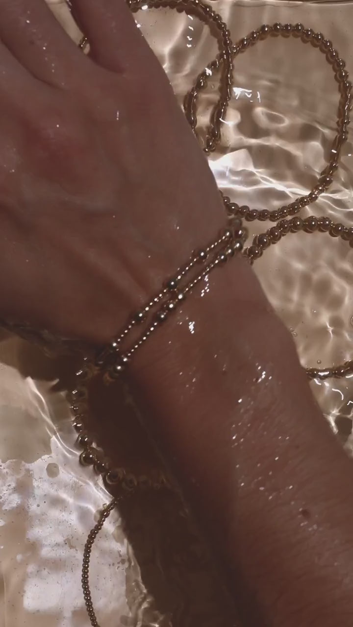 Steadfast water-resistant gold-filled bracelets in water – Sugar Bean Jewelry