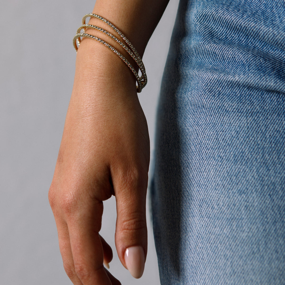 Rose gold classic crystal bangle bracelet styled with jeans – Sugar Bean Jewelry