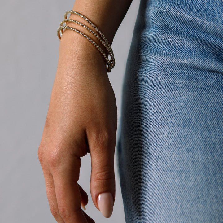 Rose gold classic crystal bangle bracelet styled with jeans – Sugar Bean Jewelry