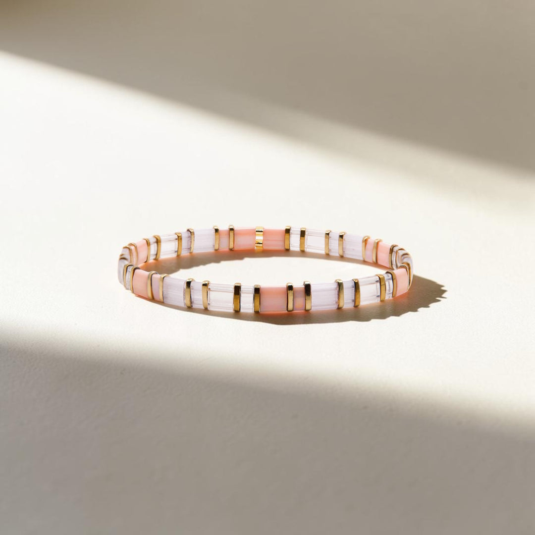 Blush, white, and gold Miyuki Tila bead bracelet on white background – Sugar Bean Jewelry