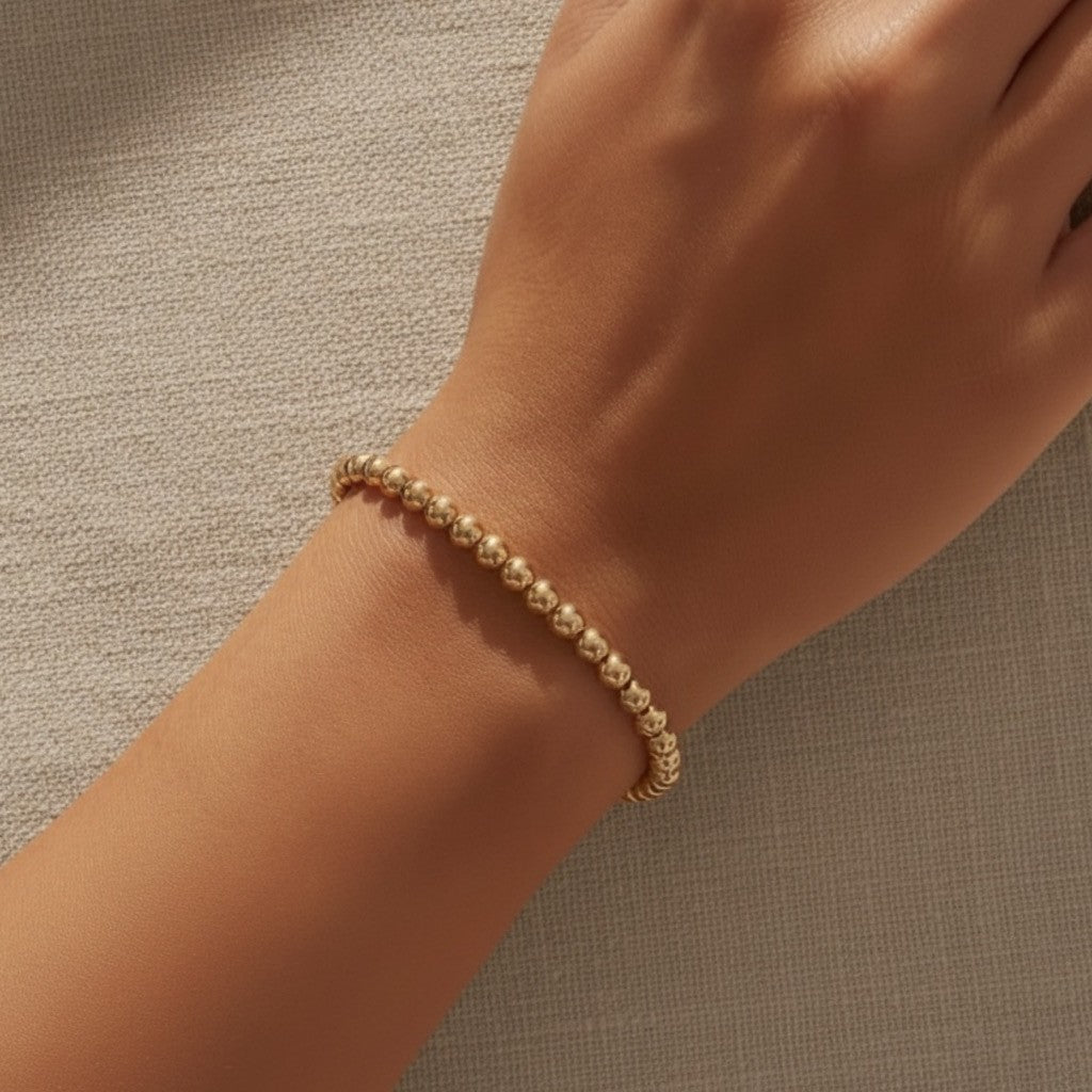 Steadfast 5mm gold filled bracelet worn on wrist – Sugar Bean Jewelry