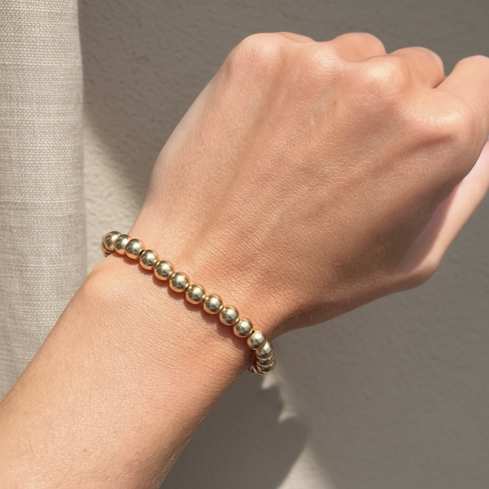 Steadfast 6mm gold filled bracelet worn on wrist – Sugar Bean Jewelry