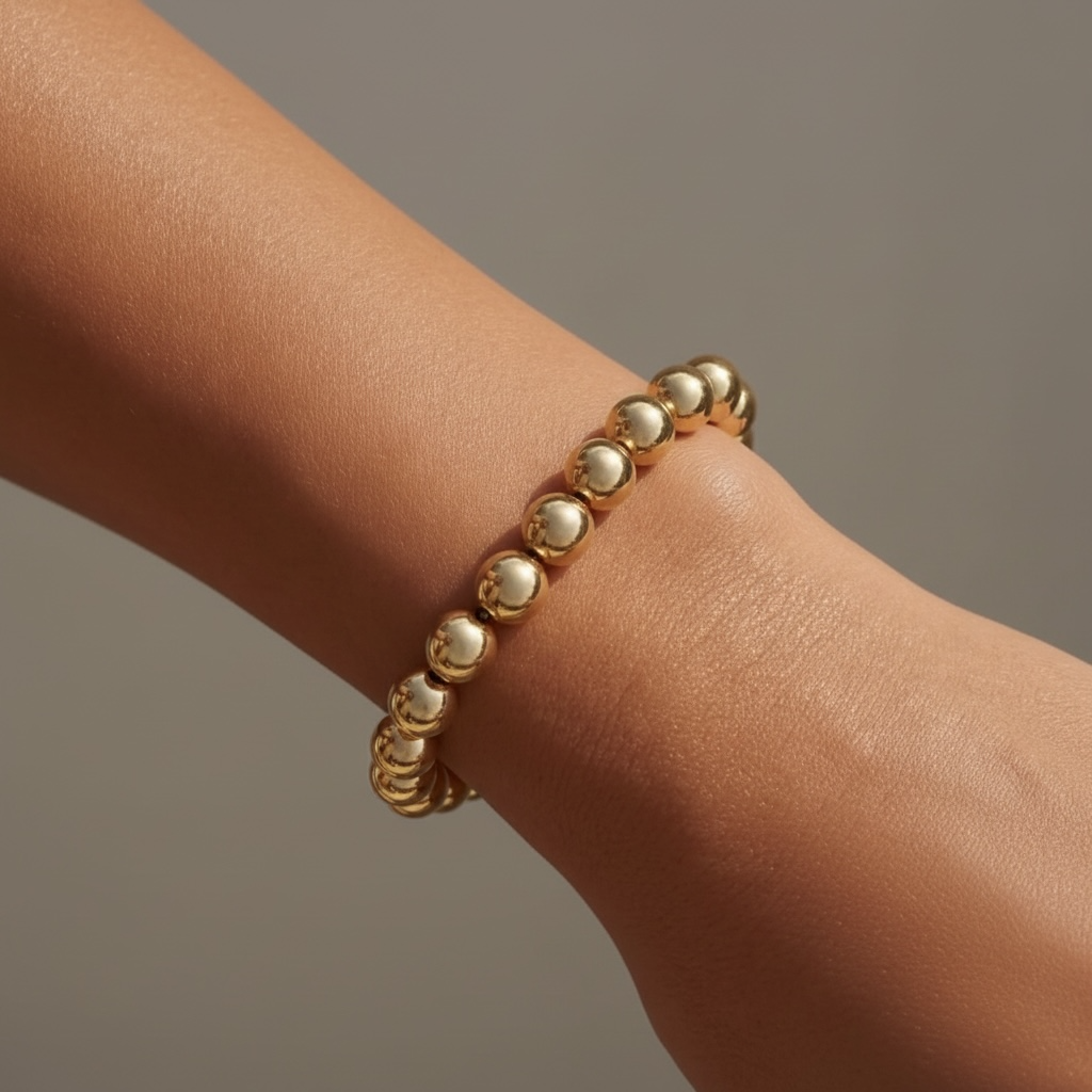 Steadfast 8mm gold filled bracelet worn on wrist – Sugar Bean Jewelry
