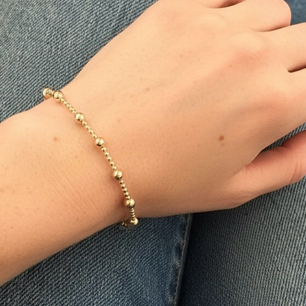 Steadfast Pulse gold filled bracelet worn on wrist – Sugar Bean Jewelry