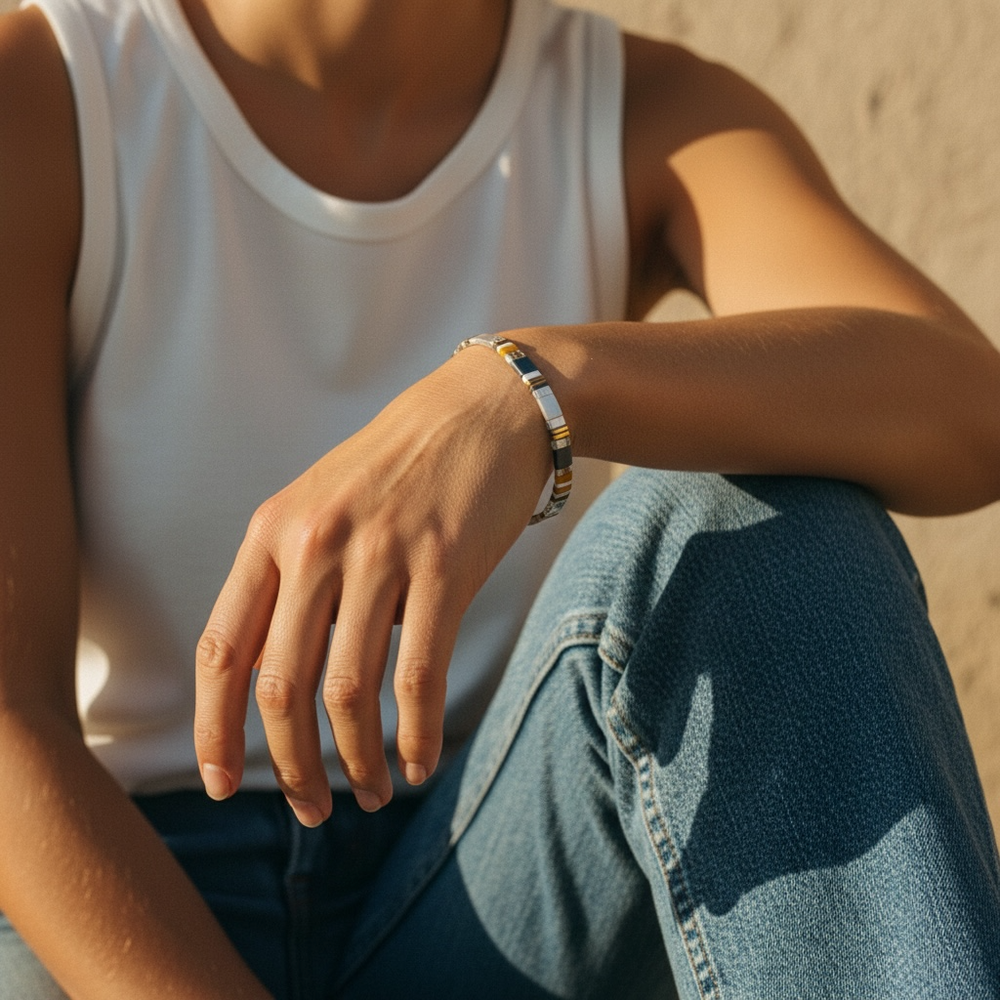 Storm Cloud Tila Bracelet worn on wrist with white tank top and denim in warm natural light