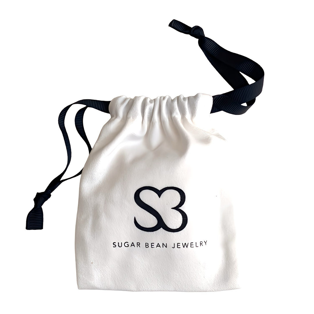 Sugar Bean Jewelry canvas gift pouch with black grosgrain ribbon and logo – included packaging with every order