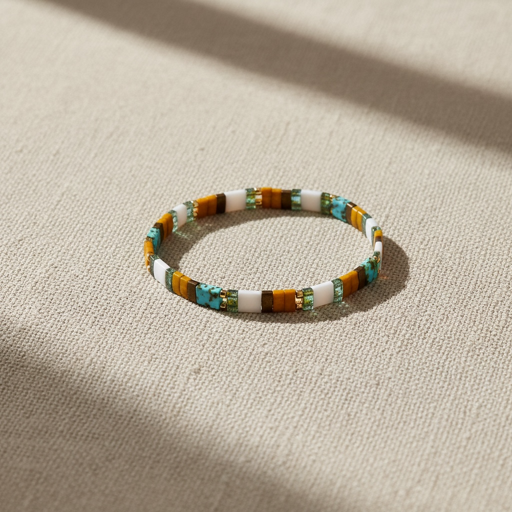 Terrain Tila Bracelet styled on linen – Sugar Bean Jewelry