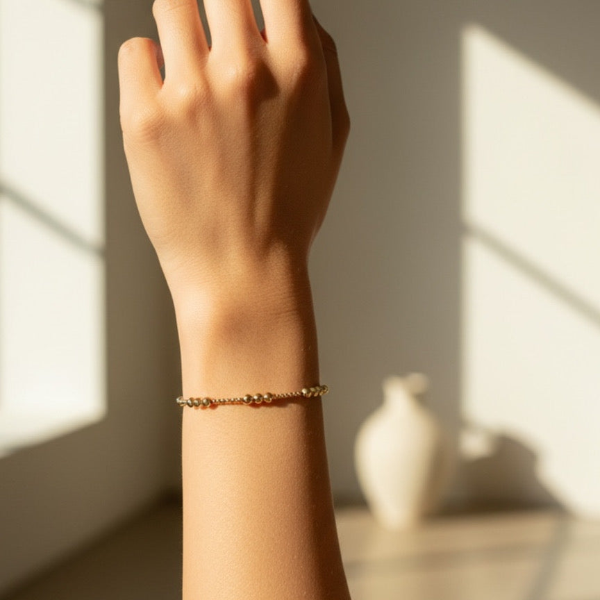 Steadfast Tempo gold filled bracelet worn on wrist – Sugar Bean Jewelry