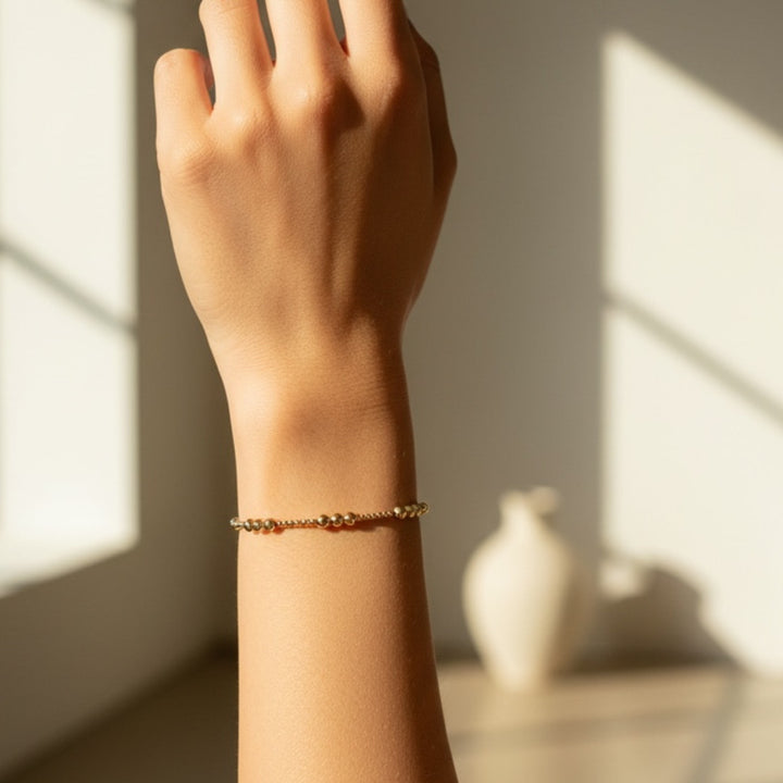 Steadfast Tempo gold filled bracelet worn on wrist – Sugar Bean Jewelry