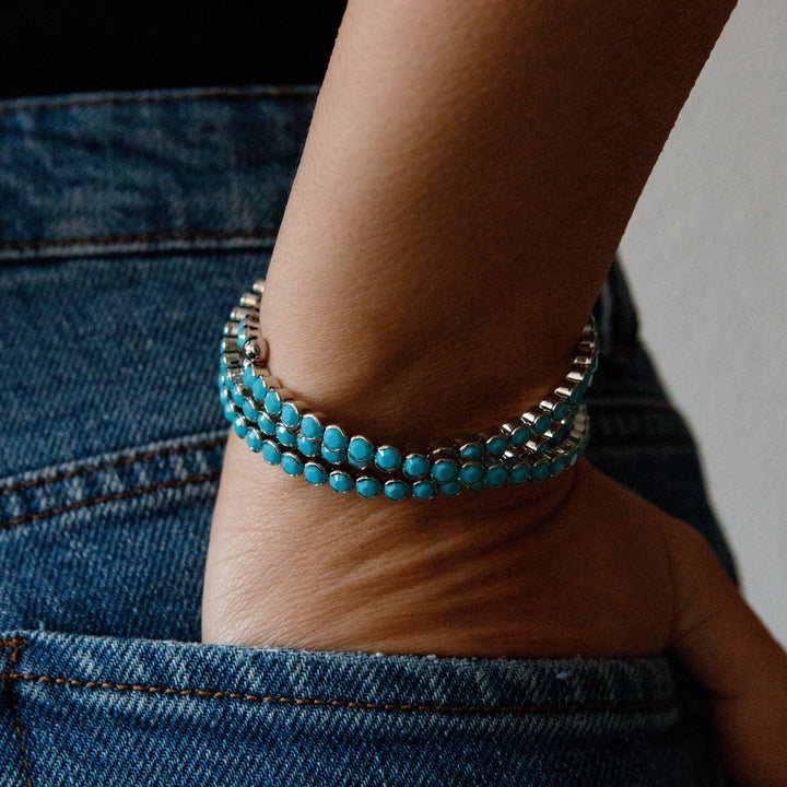 Turquoise silver statement crystal bangle bracelet worn on wrist – Sugar Bean Jewelry