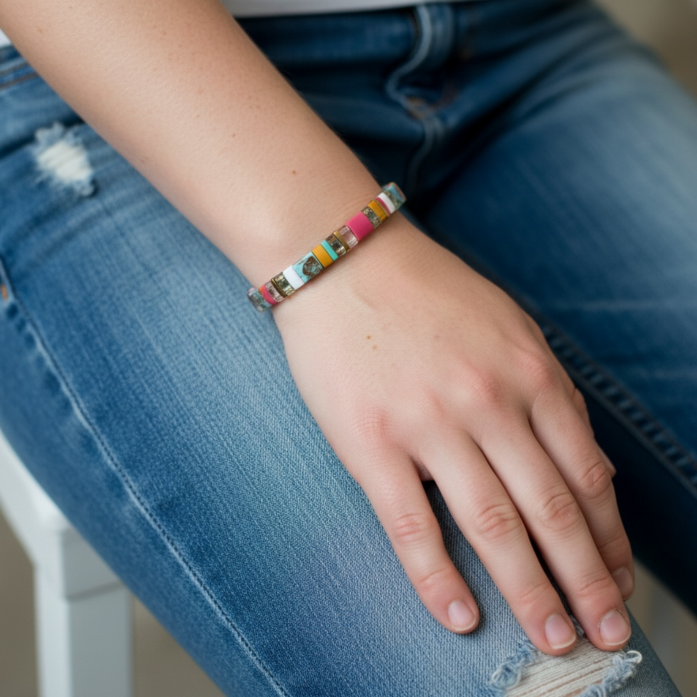 Wanderlust Tila Bracelet angled view highlighting colorful Japanese glass tile beads pictured on model