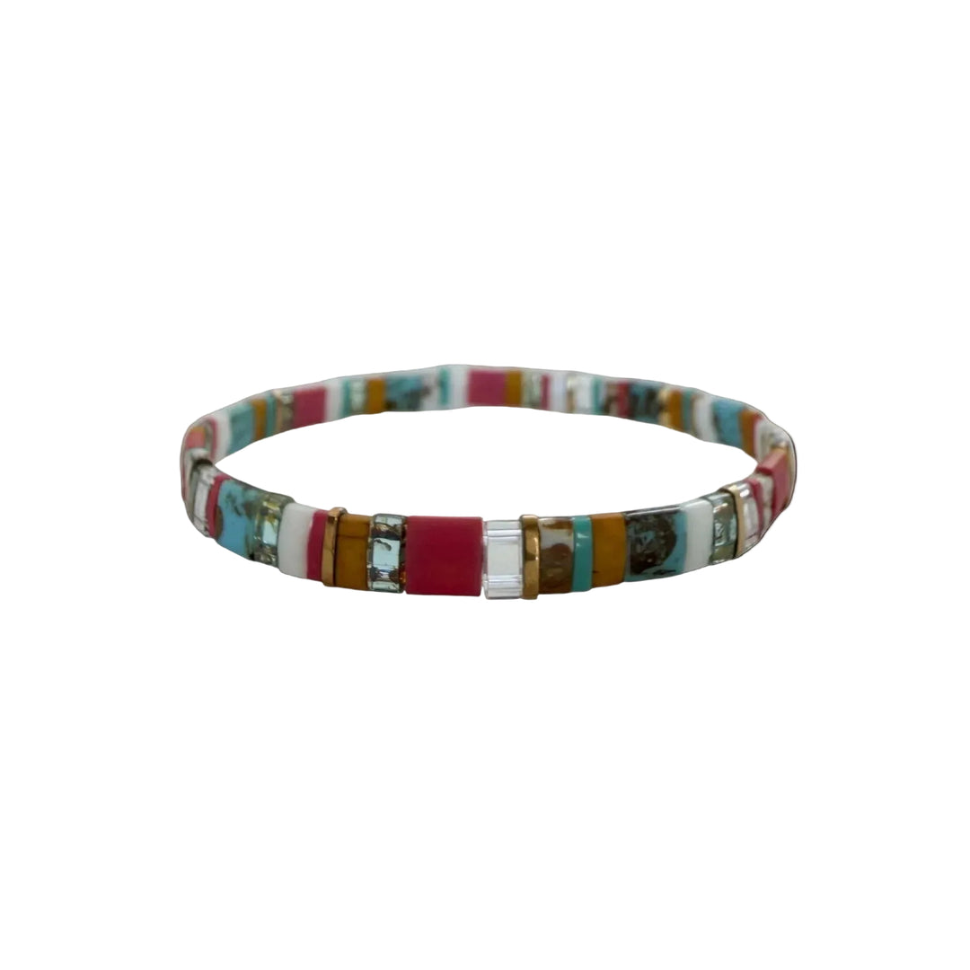 Close-up detail of Wanderlust Tila Bracelet showing turquoise matrix beads and clear crystal accents