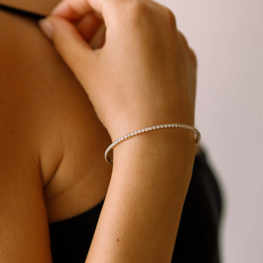 White opal classic crystal bangle bracelet worn on wrist – Sugar Bean Jewelry